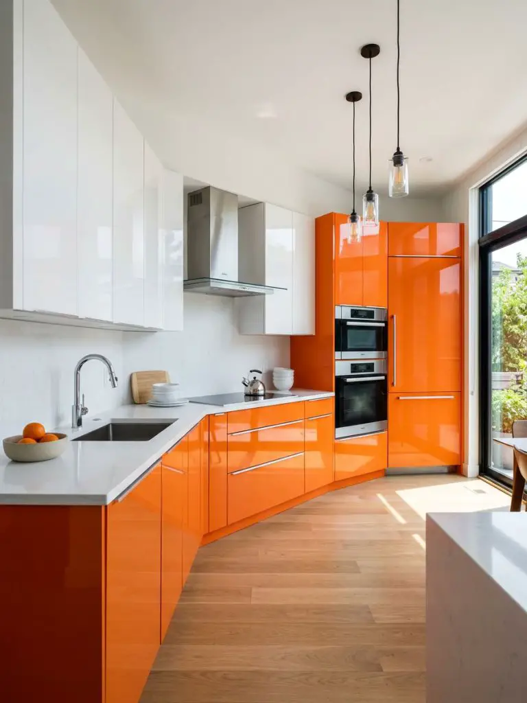 A sleek contemporary kitchen featuring high-gloss orange cabinetry paired with crisp white upper cabinets, designed in a modern minimalist s.
