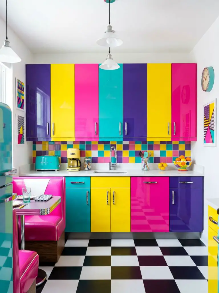 A retro-inspired kitchen with glossy multicolor cabinets in purple, yellow, teal, and pink, styled in a bold pop-art aesthetic.