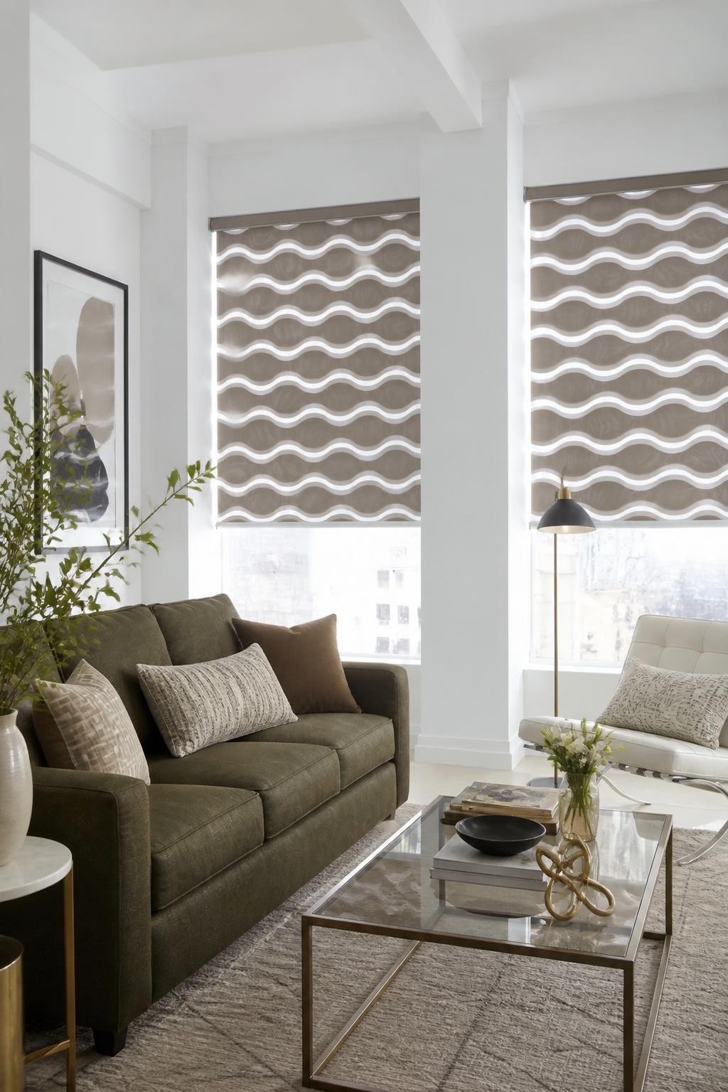 A modern, urban-chic living room with sleek white walls and wide rectangular windows adorned with taupe roller blinds featuring a bold wavy.